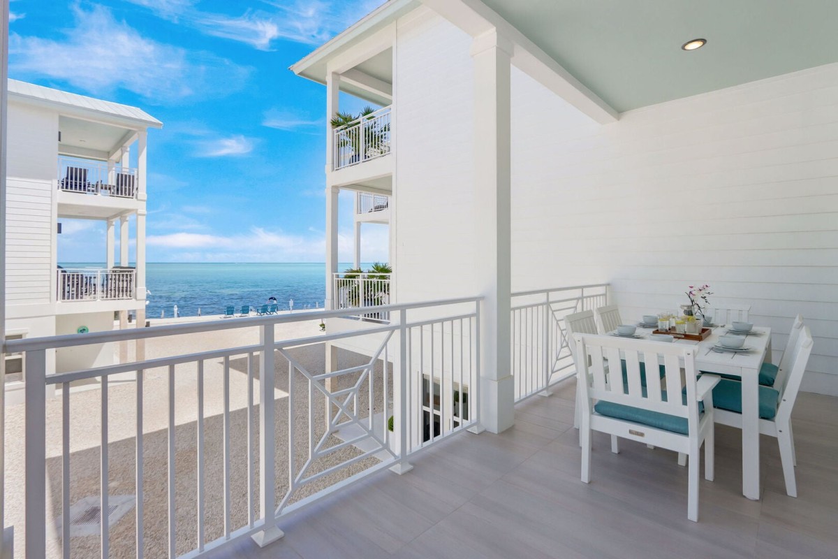 Second Floor Private Balcony | Offers a beautiful dining table for six, and ocean view.