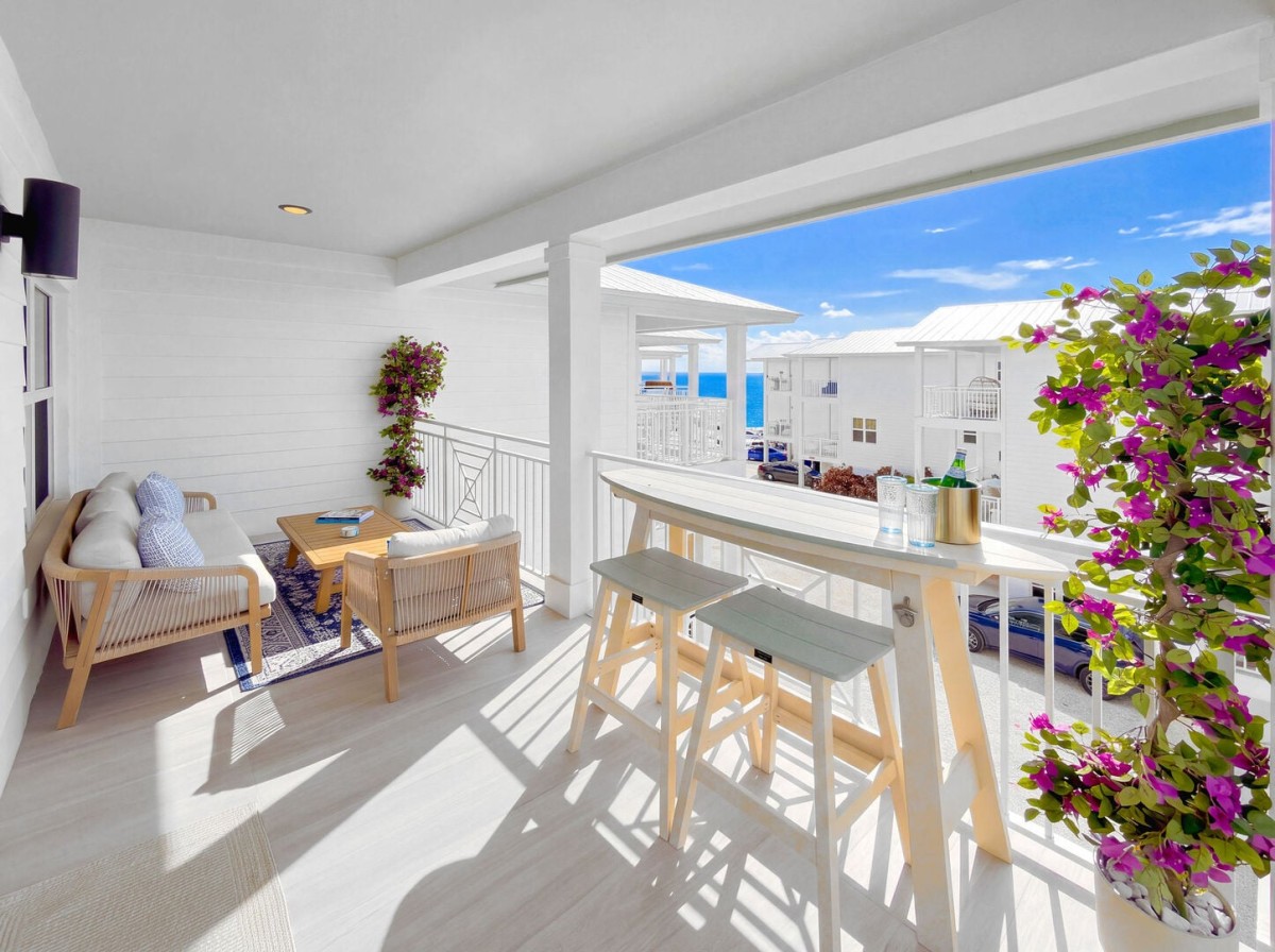 Private primary bedroom balcony + partial ocean view