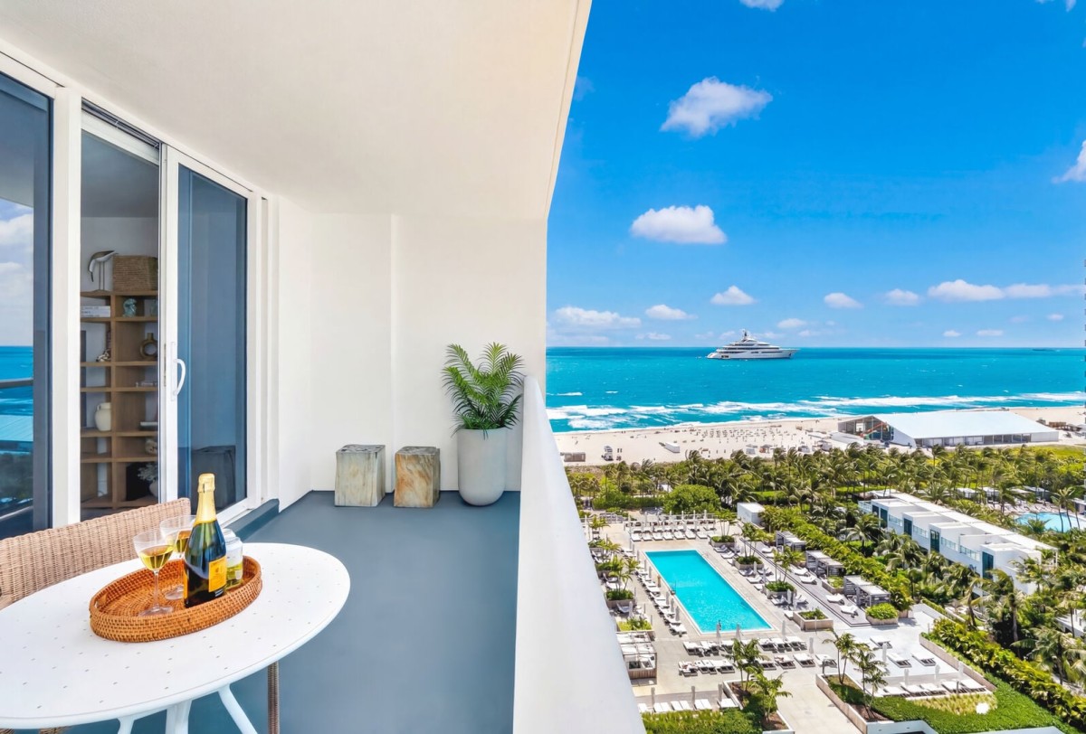 Private balcony with stunning ocean + pool views