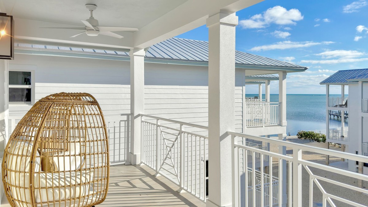 Third Floor Private Balcony | Located off the primary suite, and offers a partial view of the water.